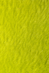 黄緑色のパステルカラーの柔らかい布地