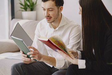 Handsome man in a white shirt. Businessman working in a office. Woman with her partner.