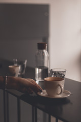 cup of coffee in hand