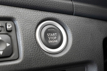 start stop engine button in the car interior close-up