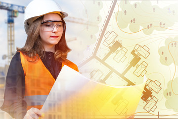 Cartography and geodesy. The girl works as a cartographer. A woman makes maps. A girl in a white...