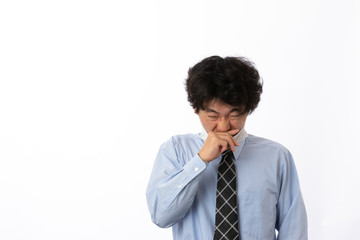 風邪の症状があるビジネスマン