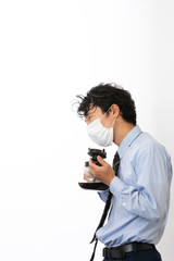 Fototapeta premium 嗅覚異常の症状があるビジネスマン