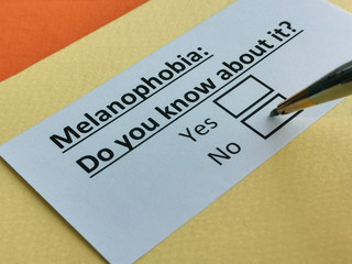 One person is answering question about melanophobia.