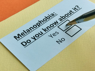 One person is answering question about melanophobia.