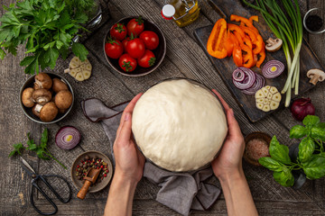 cooking and baking ingredients, dough in bowl,  fresh vegetables, greens and mushroom