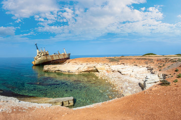 Cyprus beach. An abandoned ship off the coast of Cyprus. Shipwre