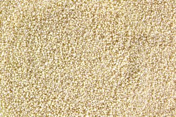 Couscous grains background.