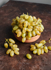 green grape on a wooden background