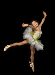 Girl in ballet with dress and sneakers