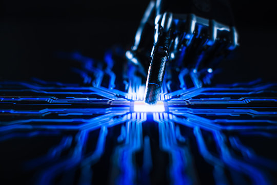 Digitalization Concept: Futuristic Robot Arm Interacting with Screen, Finger Touches Display and Activates Artificial Intelligence. Visualization of in Machine Learning, Computer Technology, Science