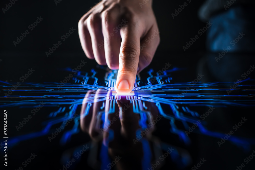 Poster digitalization concept: human finger pushes touch screen button and activates futuristic artificial 