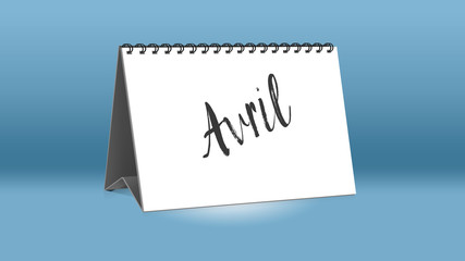 Ein Kalender für den Schreibtisch zeigt den französischen Monat Avril (April in deutscher Sprache)