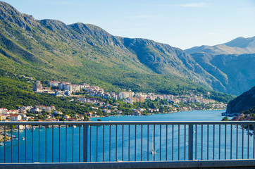 Picturesque panoramic view of ancient old town of Dubrovnik, Croatia with marina and port and bay...