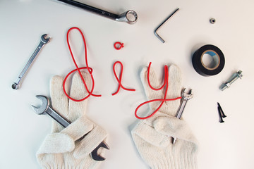 Construction tools DIY background concept. Flat lay composition with different construction tools on white  background.