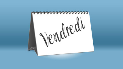 Ein Kalender für den Schreibtisch zeigt den französischen Wochentag Vendredi (Freitag in deutscher Sprache)