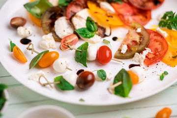 carpese salad with cheese and vegetables