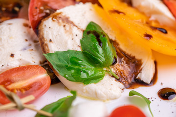 carpese salad with cheese and vegetables