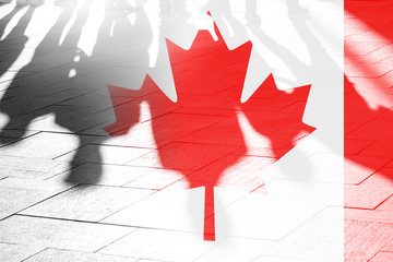 Shadows of people and Flag of Canada
on surface, concept political picture