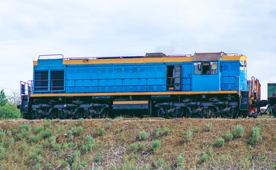 Old diesel locomotive transit tractor on railway