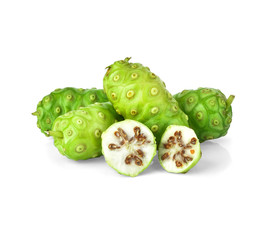 Noni or Morinda Citrifolia fruits with sliced and green leaf isolated on white background (Rubiaceae Noni, great morinda, indian mulberry, beach mulberry, cheese fruit, Gentianales)