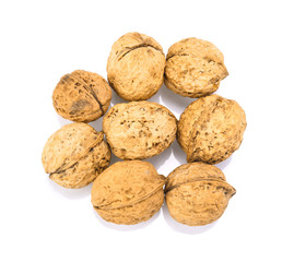 Walnuts on a white background top view