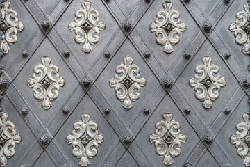 Texture of metal ornament plate as a vintage door decoration