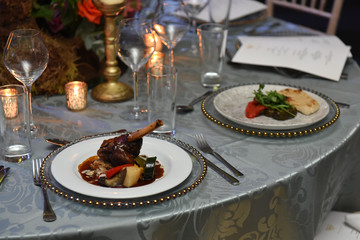 Rack of lambs served on a table