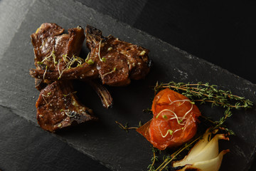 Rack of lambs served on a table