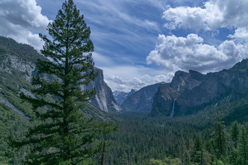mountain in Yosemite National Park in sunny weather blue sky with clouds
