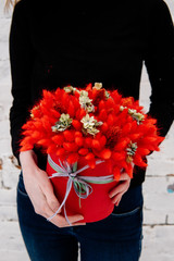 Bouquet in red hat box of dried flowers