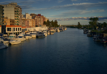 Fototapeta premium Cullera fisherboats port in Xuquer Jucar river. Coastline, beautiful.