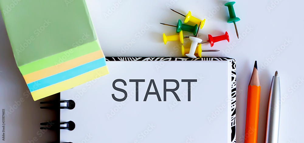 Poster start .desk with stationary and notebook with text and stickers.