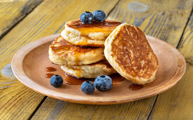 Stack of ricotta pancakes on the plate