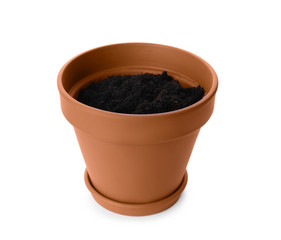 Stylish terracotta flower pot with soil isolated on white