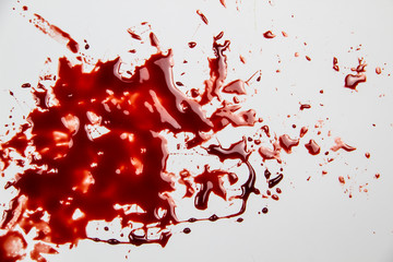 A blood on the white background. Bloody pattern. Concepts of blood can be used in design