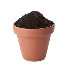 Terracotta flower pot full of soil isolated on white