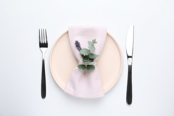 Stylish elegant table setting on white background, top view