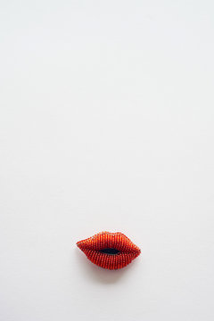 Lips made of bissen on a white background. Minimalism. Handmade. Abstraction