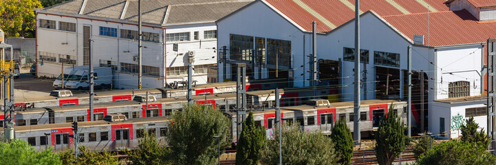 Locomotive and passenger train depot in european city