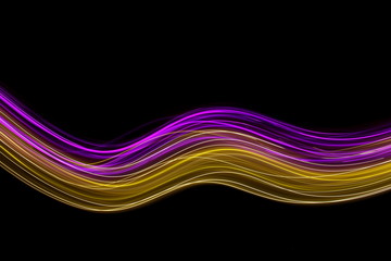 Long exposure photograph of neon pink and gold colour in an abstract swirl, parallel lines pattern against a black background. Light painting photography.
