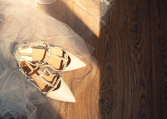 wedding shoes on the wooden floor