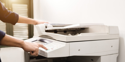 Business people keypad hand on the panel printer, printer, scanner, laser copier, office equipment, concept, start working