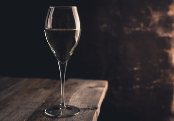 White wine on the rustic background. Selective focus. Shallow depth of field.