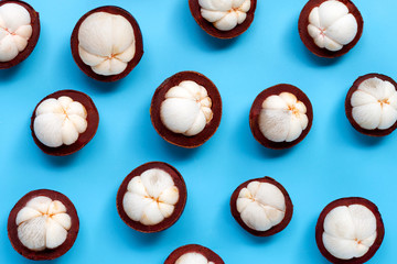 Mangosteen on blue background. Top view