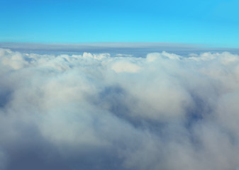 Fototapeta na wymiar Blue Sky And Fluffy Clouds View 