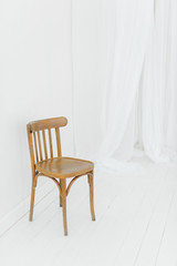 Fototapeta premium old white chair in the room