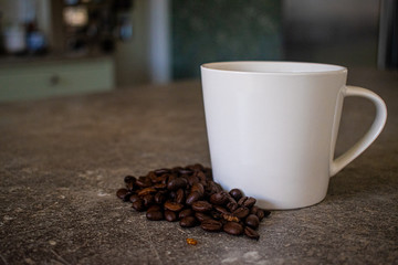 cup of coffee with beans