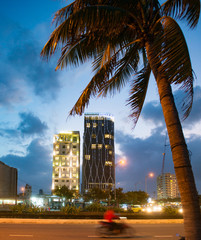 Fototapeta na wymiar dda nang vietnam 10.17.19 colorful sunset blue sky and palm tree