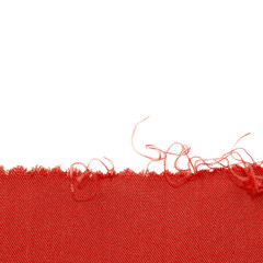 Red rag background with torn ragged edge. Fabric texture, sewing material, torn cloth. Cut piece of fabric. Frame isolated on a white background. Template, background, empty space.